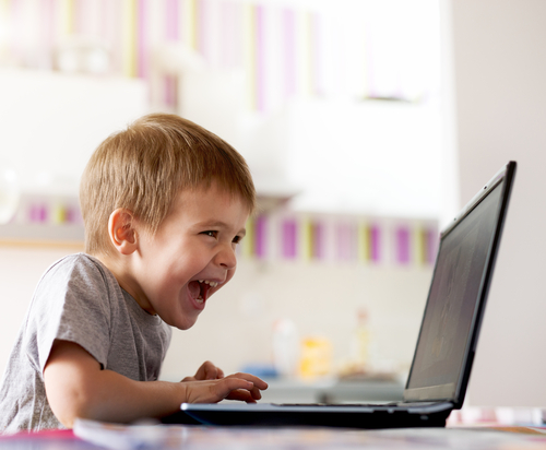 young boy on laptop